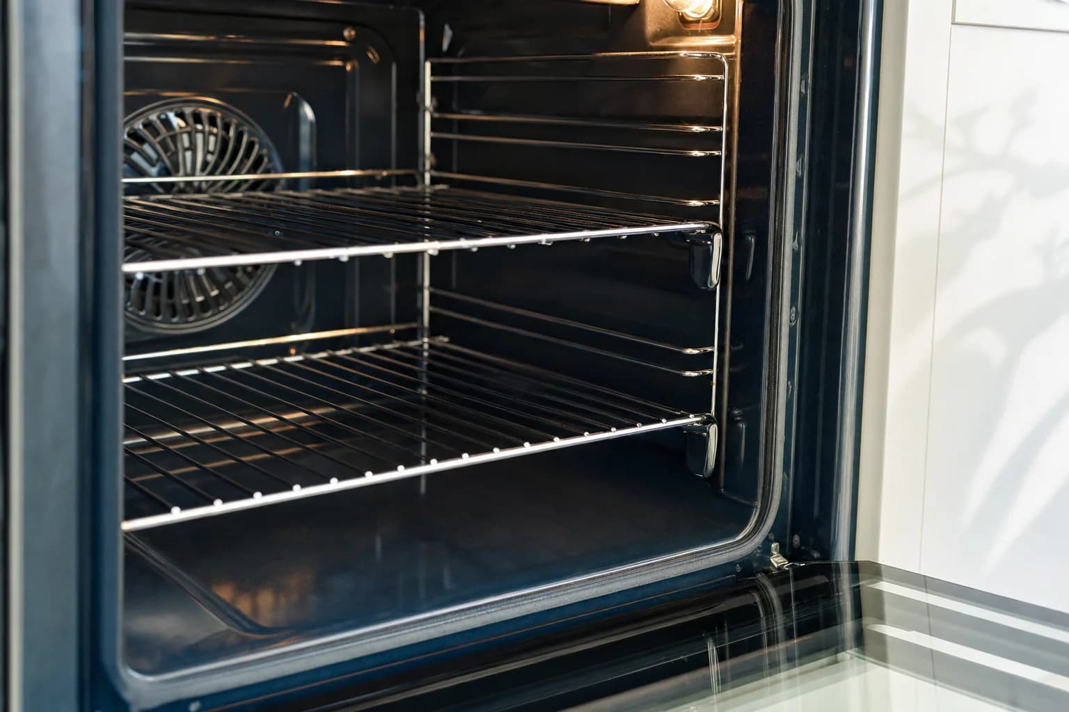 A degreased oven cavity with bright racks